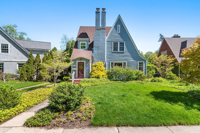 1308 Linwood Ave, Ann Arbor, MI 48103 - view of front of house featuring a chimney and a front lawn