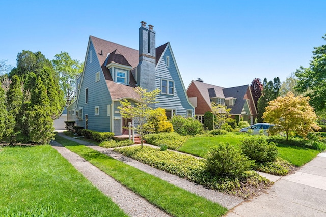 1308 Linwood Ave, Ann Arbor, MI 48103 - view of property exterior with a chimney and a yard