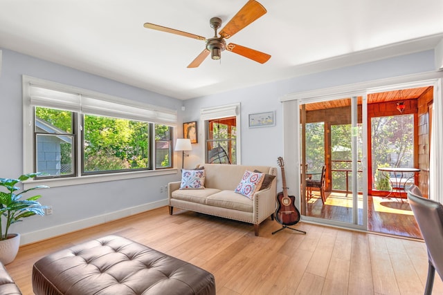 1308 Linwood Ave, Ann Arbor, MI 48103 - living room featuring ceiling fan, light wood finished floors, and baseboards