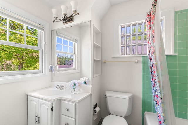 1308 Linwood Ave, Ann Arbor, MI 48103 - full bathroom with vanity, toilet, shower / tub combo, and a chandelier
