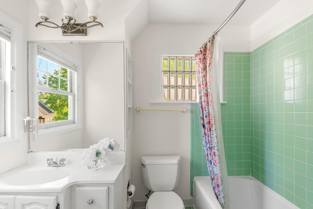1308 Linwood Ave, Ann Arbor, MI 48103 - full bath with vanity, shower / bath combo, toilet, and a chandelier