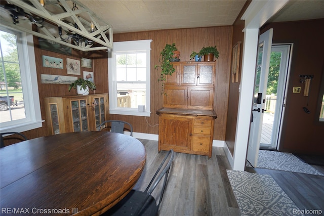 20375 Sumpter Rd, Belleville, MI 48111 - dining space with wooden walls and wood finished floors