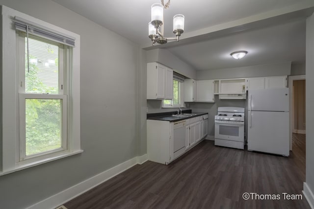 41 Grove St NE, Grand Rapids, MI 49505 - kitchen featuring white appliances, under cabinet range hood, a sink, white cabinetry, and a chandelier