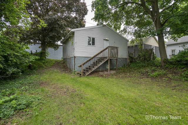41 Grove St NE, Grand Rapids, MI 49505 - back of property featuring a yard and stairs