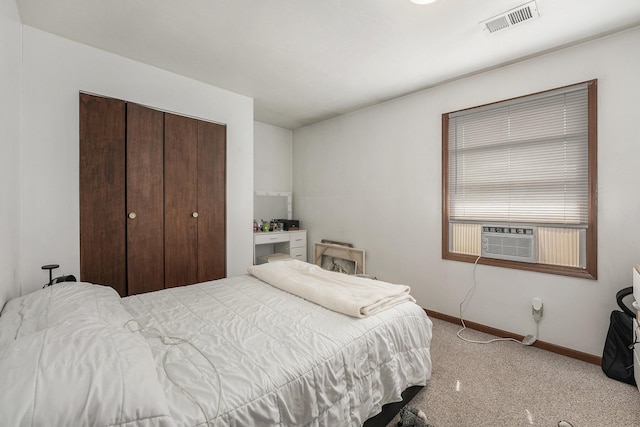 41 E 48th St, Holland, MI 49423 - bedroom with carpet flooring, a closet, baseboards, and cooling unit
