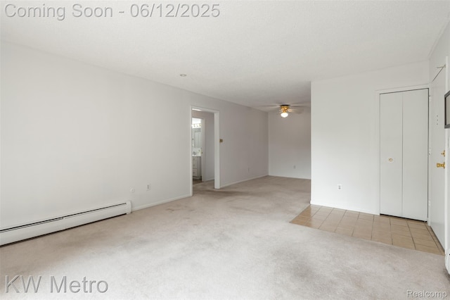 4909 Crooks Rd Unit E8, Royal Oak, MI 48073 - carpeted empty room with a ceiling fan and baseboard heating