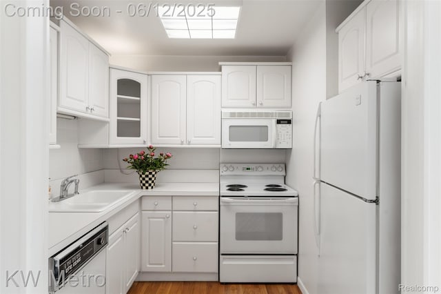 4909 Crooks Rd Unit E8, Royal Oak, MI 48073 - kitchen with white appliances, a sink, and white cabinetry