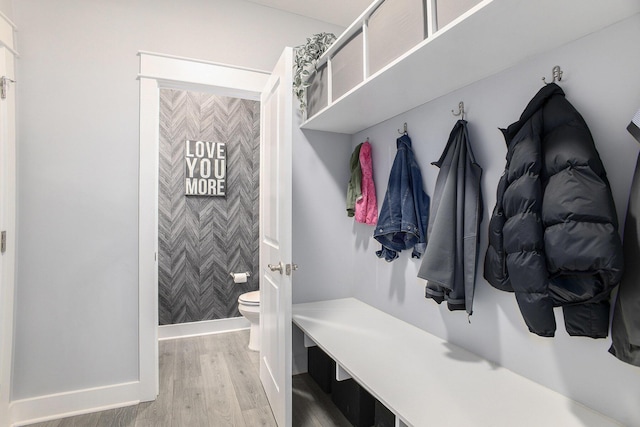 82 Dickens St, Spring Arbor, MI 49283 - mudroom with light wood-style floors and baseboards