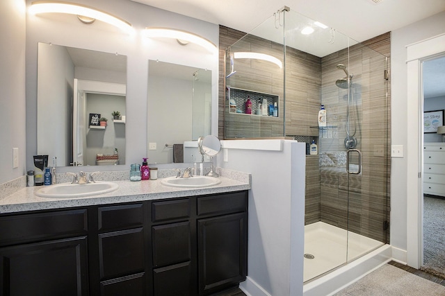 82 Dickens St, Spring Arbor, MI 49283 - full bathroom with double vanity, a stall shower, and baseboards