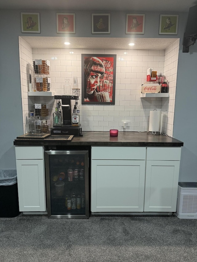 82 Dickens St, Spring Arbor, MI 49283 - indoor dry bar with wine cooler and decorative backsplash
