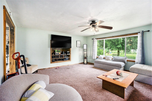 1027 E Railroad St, Hastings, MI 49058 - living area with a ceiling fan, carpet, and baseboards
