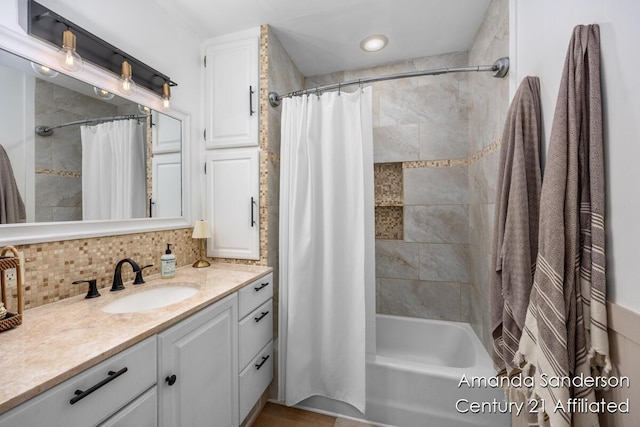 620 Emerald Ave NE, Grand Rapids, MI 49503 - full bathroom featuring vanity, shower / tub combo with curtain, and backsplash