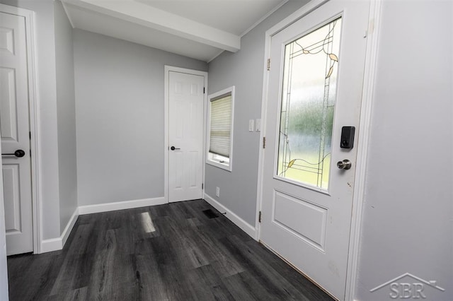 2832 N W River Rd, Sanford, MI 48657 - entrance foyer with dark wood-type flooring and baseboards
