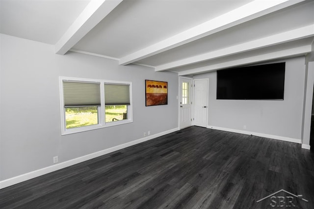 2832 N W River Rd, Sanford, MI 48657 - unfurnished living room featuring beam ceiling, baseboards, and dark wood-type flooring
