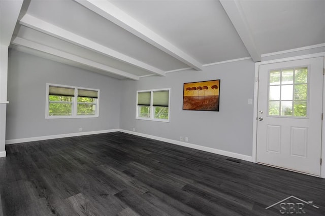 2832 N W River Rd, Sanford, MI 48657 - unfurnished living room featuring beamed ceiling, baseboards, and dark wood-type flooring