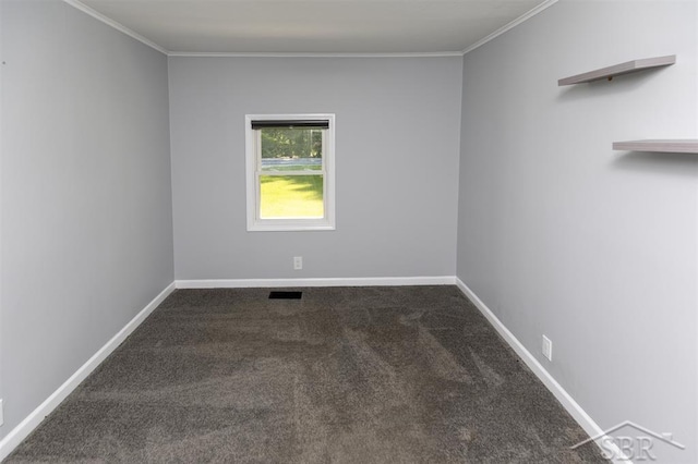 2832 N W River Rd, Sanford, MI 48657 - empty room featuring carpet floors, ornamental molding, and baseboards