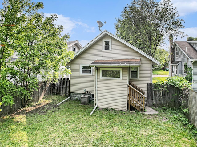 904 Riverview Ave, Lansing, MI 48915 - rear view of property with central air condition unit