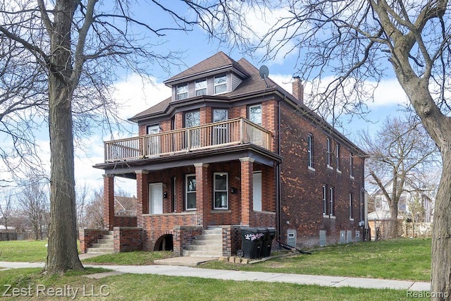 2977 Canton St, Detroit, MI 48207 - view of front facade with a chimney, a front yard, brick siding, a porch, and a balcony