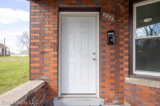 2977 Canton St, Detroit, MI 48207 - property entrance featuring brick siding