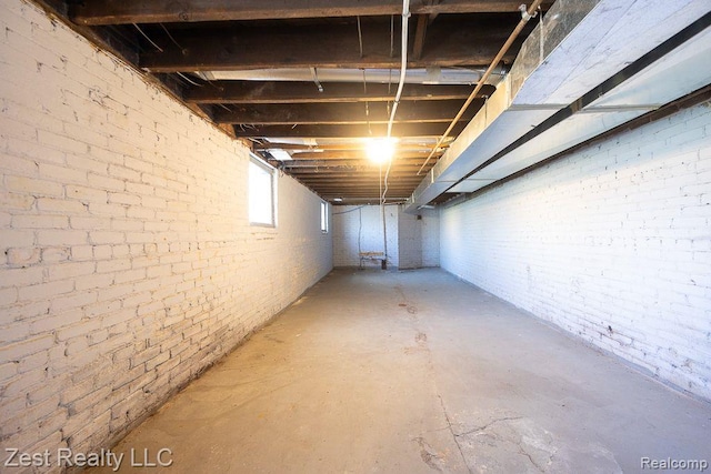 2977 Canton St, Detroit, MI 48207 - below grade area featuring brick wall