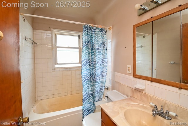 3500 Hogarth Ave, Flint, MI 48532 - bathroom with shower / tub combo, toilet, vanity, and tile walls