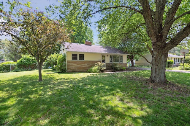 1279 Cunningham, Jackson, MI 49201 - single story home with a chimney and brick siding