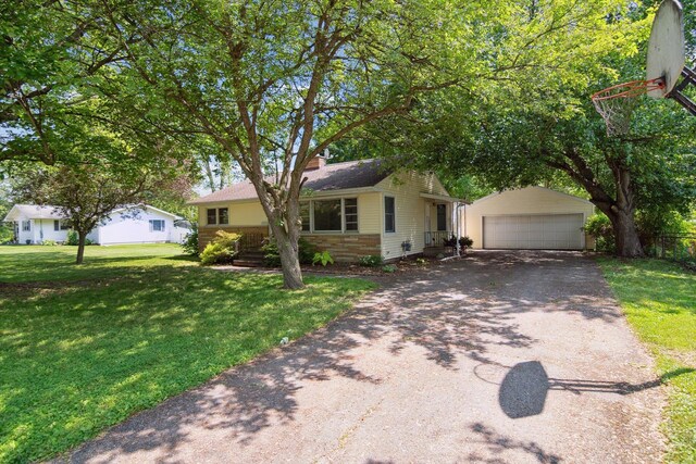 1279 Cunningham, Jackson, MI 49201 - ranch-style house featuring an outdoor structure, a front lawn, a garage, and a chimney