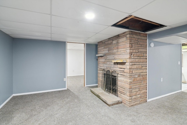 1279 Cunningham, Jackson, MI 49201 - unfurnished living room featuring carpet, baseboards, a fireplace, and a paneled ceiling