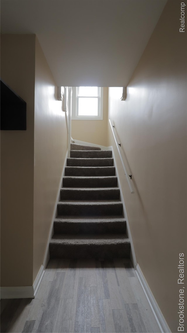 22101 Francis St, Dearborn, MI 48124 - stairway with wood finished floors and baseboards