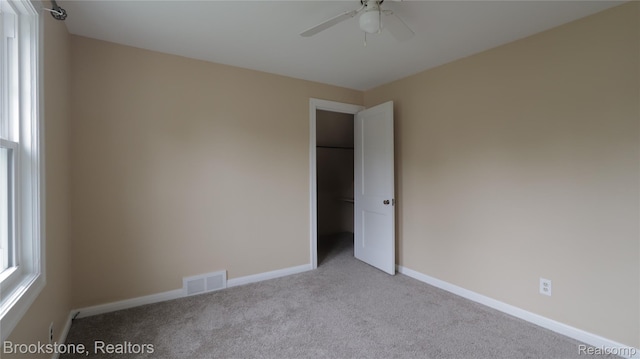22101 Francis St, Dearborn, MI 48124 - unfurnished room featuring carpet floors, ceiling fan, and baseboards