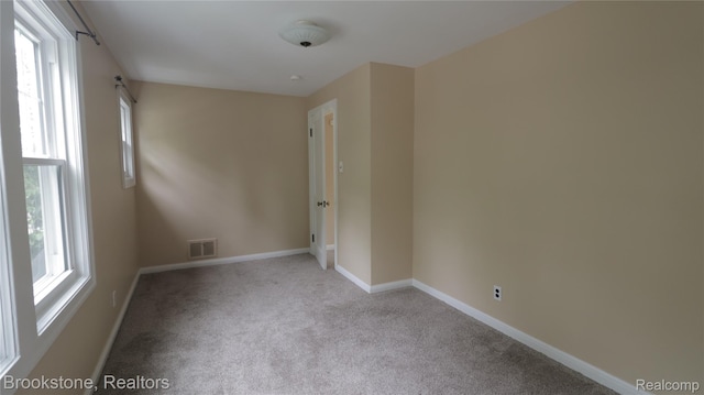 22101 Francis St, Dearborn, MI 48124 - carpeted spare room with baseboards