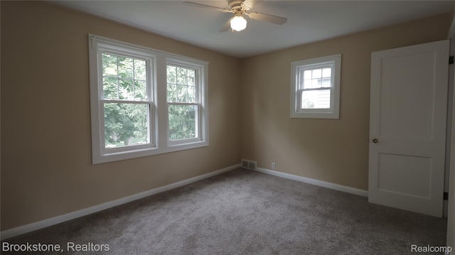 22101 Francis St, Dearborn, MI 48124 - empty room featuring ceiling fan, carpet floors, and baseboards