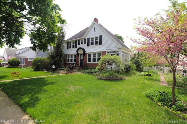 22101 Francis St, Dearborn, MI 48124 - view of front of property featuring brick siding and a chimney