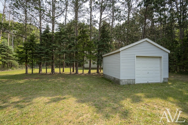 7936 Whitehall Rd, Whitehall, MI 49461 - view of grassy yard with an outdoor structure and a garage