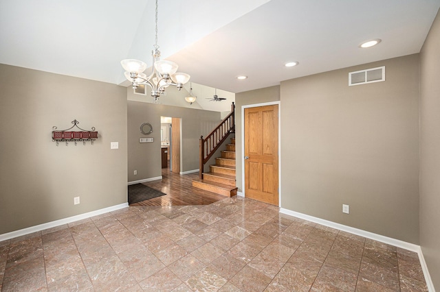 224 S Jameson St, New Buffalo, MI 49117 - unfurnished room featuring baseboards, a chandelier, stairway, vaulted ceiling, and recessed lighting