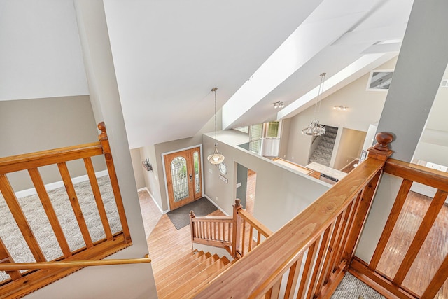 224 S Jameson St, New Buffalo, MI 49117 - foyer entrance with vaulted ceiling, baseboards, and stairway