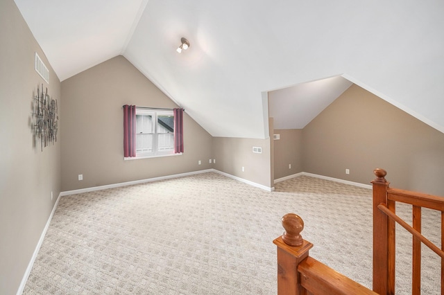 224 S Jameson St, New Buffalo, MI 49117 - bonus room featuring carpet floors, vaulted ceiling, and baseboards