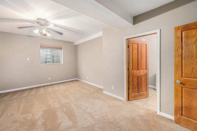 224 S Jameson St, New Buffalo, MI 49117 - unfurnished room featuring light carpet, ceiling fan, and baseboards