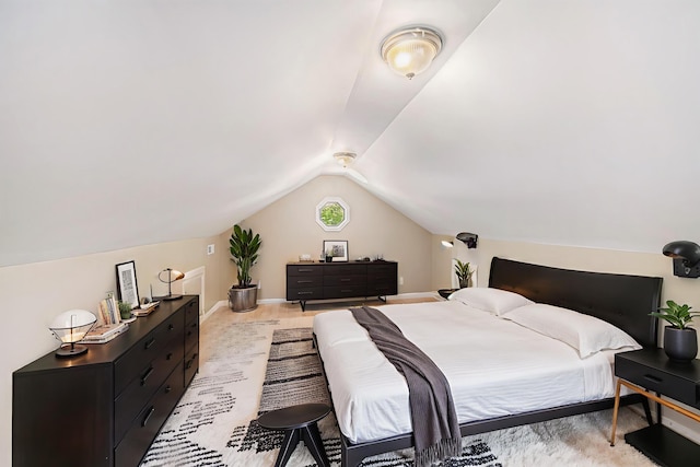 224 S Jameson St, New Buffalo, MI 49117 - bedroom with vaulted ceiling and baseboards