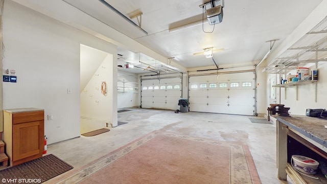 224 S Jameson St, New Buffalo, MI 49117 - garage featuring a garage door opener