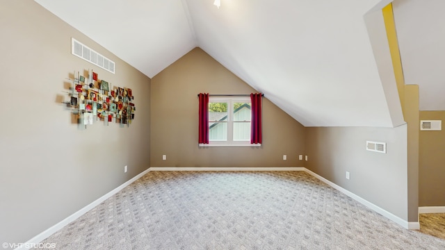 224 S Jameson St, New Buffalo, MI 49117 - additional living space with lofted ceiling, carpet, and baseboards
