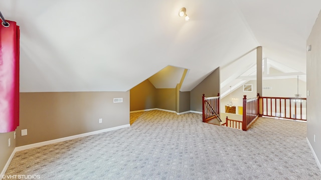 224 S Jameson St, New Buffalo, MI 49117 - bonus room featuring carpet flooring, vaulted ceiling, and baseboards