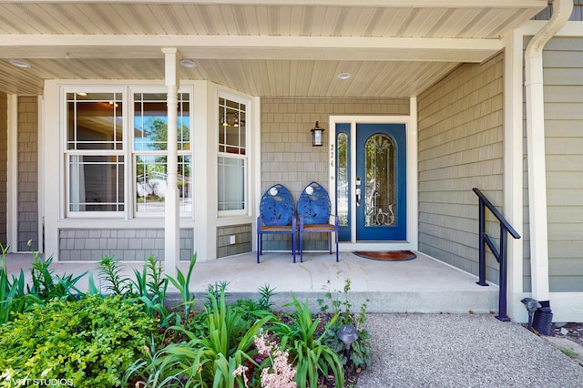 224 S Jameson St, New Buffalo, MI 49117 - doorway to property with a porch