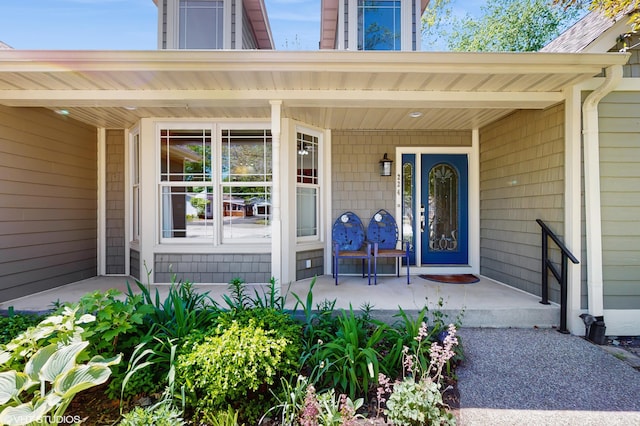 224 S Jameson St, New Buffalo, MI 49117 - property entrance with a porch
