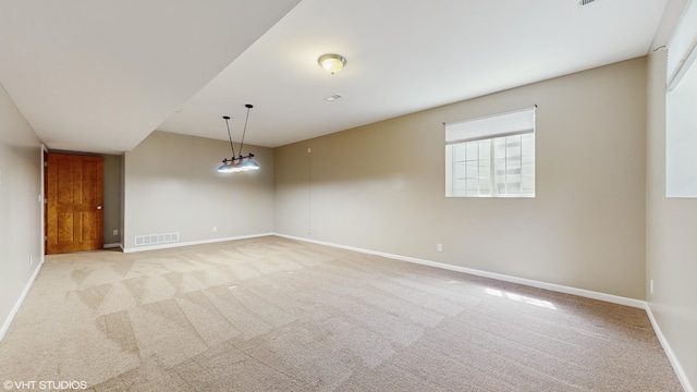 224 S Jameson St, New Buffalo, MI 49117 - spare room with baseboards and light carpet