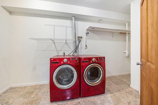 224 S Jameson St, New Buffalo, MI 49117 - washroom with separate washer and dryer and baseboards