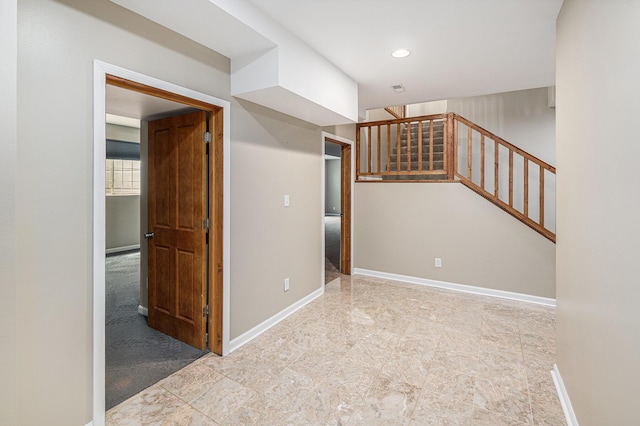 224 S Jameson St, New Buffalo, MI 49117 - spare room with baseboards, stairway, and recessed lighting