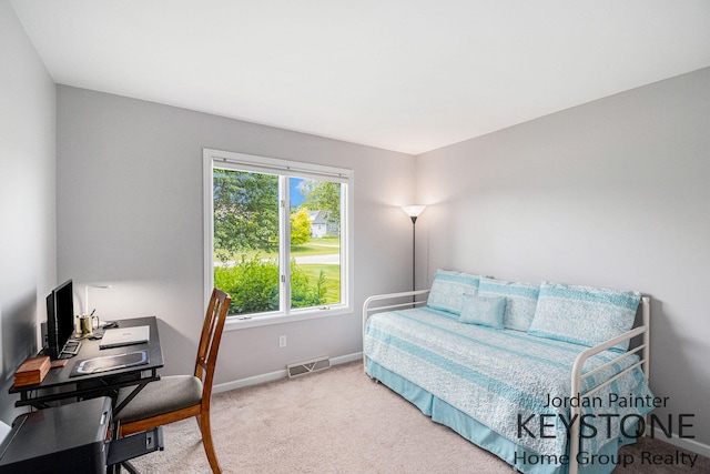 5896 Rollaway Dr NE, Comstock Park, MI 49321 - carpeted bedroom with baseboards and an office area
