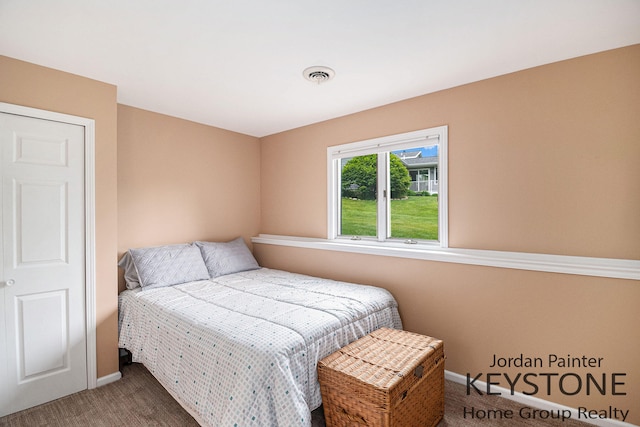 5896 Rollaway Dr NE, Comstock Park, MI 49321 - carpeted bedroom with baseboards