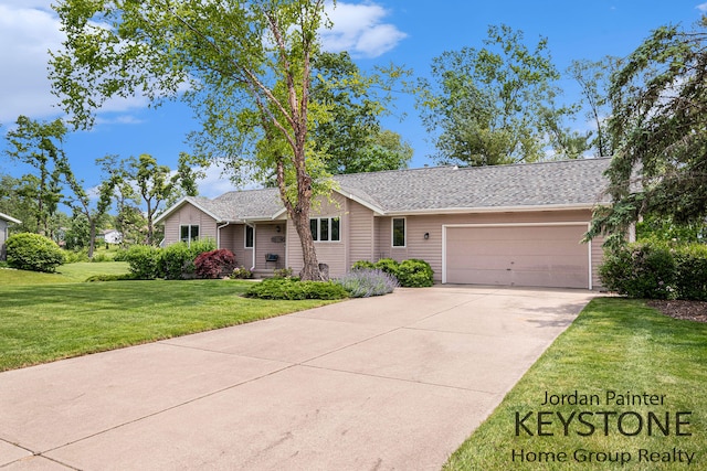 5896 Rollaway Dr NE, Comstock Park, MI 49321 - ranch-style house with a garage, driveway, and a front yard